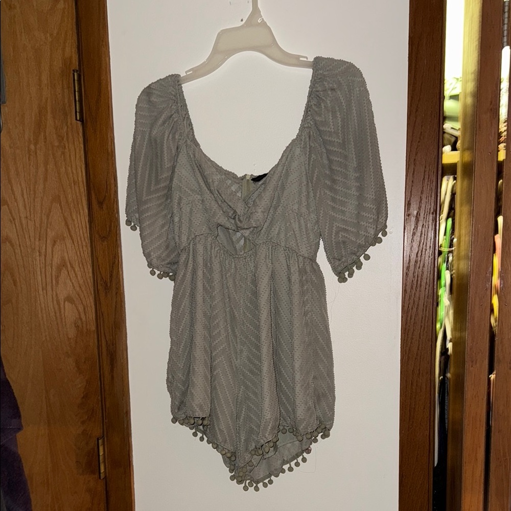Green women’s romper worn once